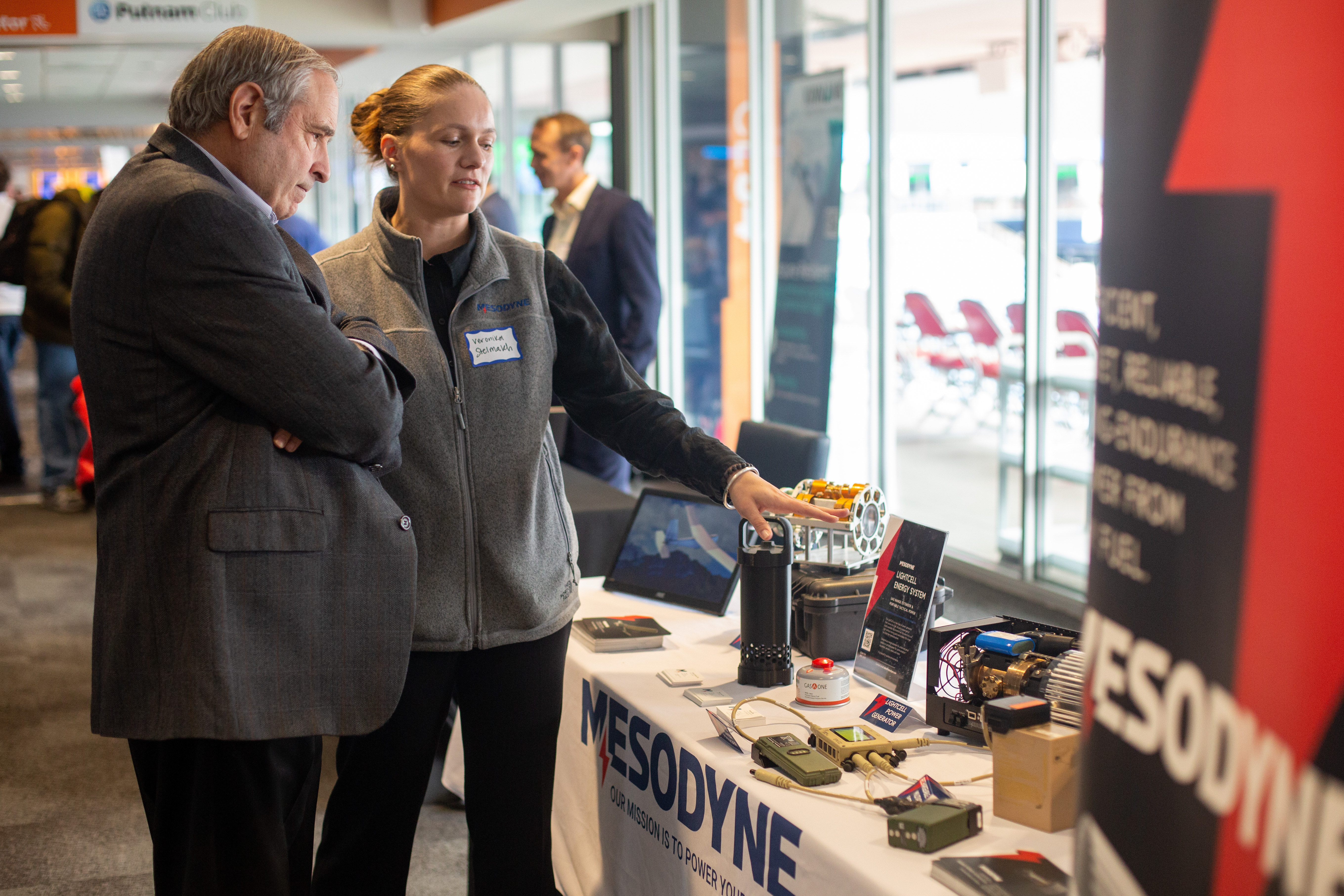 Participants showing technology at the booths